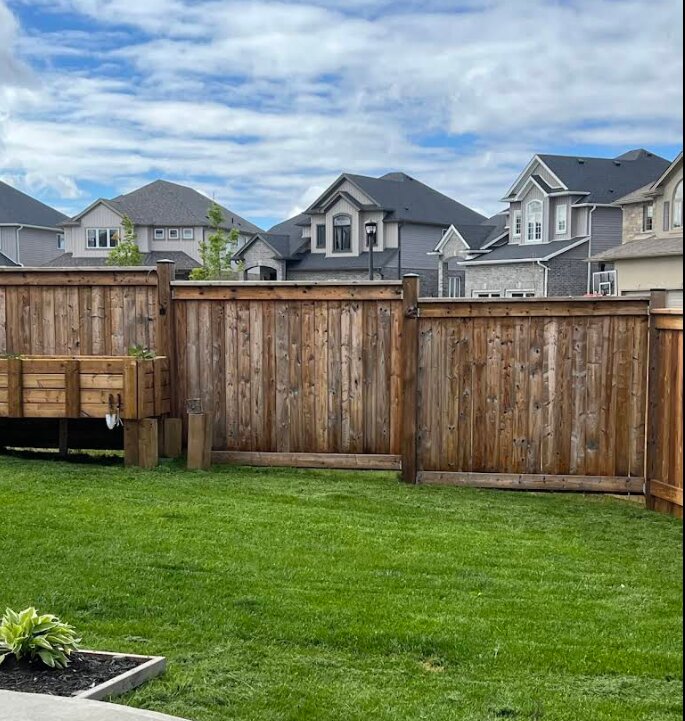 S.G.A Lawn Care crew working on lawn